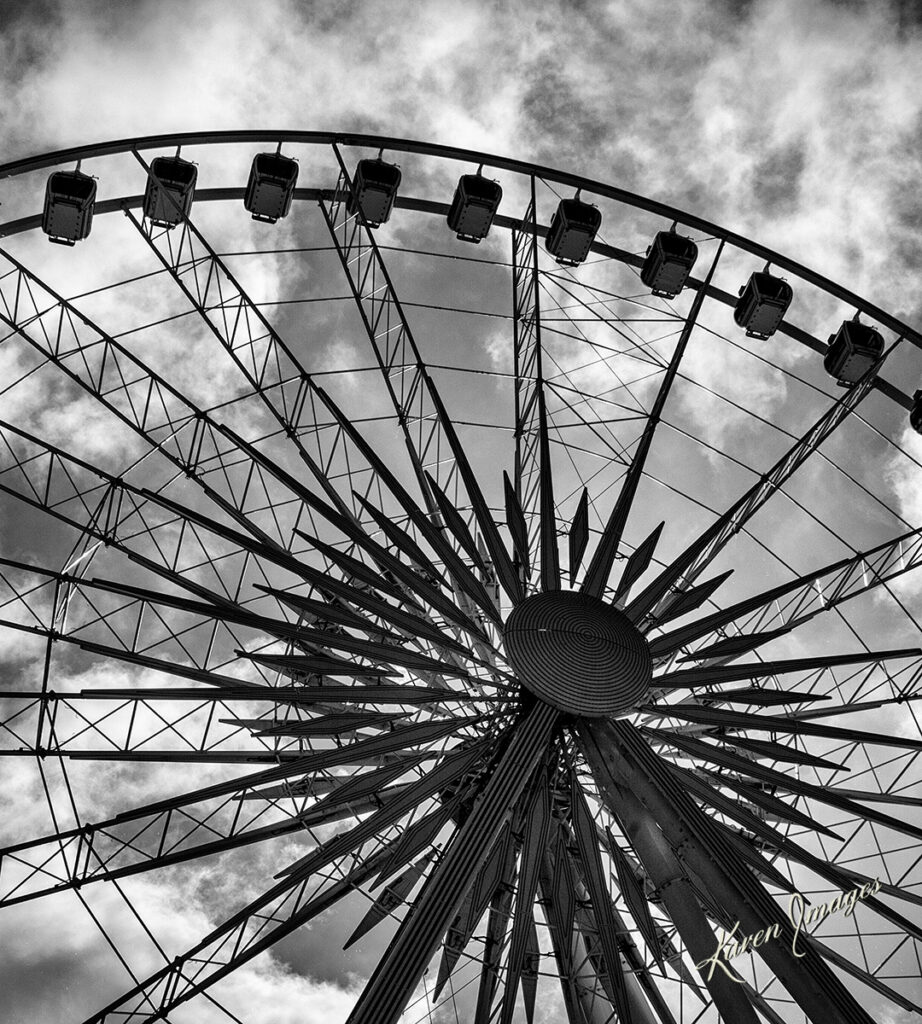 A black and white image of fine art photography of the Skywheel in Atlanta, Georgia photographed by Atlanta Fine Art Photographer Karen Images