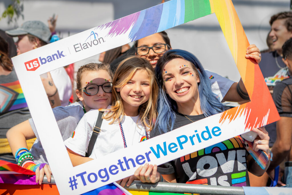 Image of a family group of people at a Pride event in Atlanta, Georgia photographed by Atlanta Commercial Photographer Karen Images