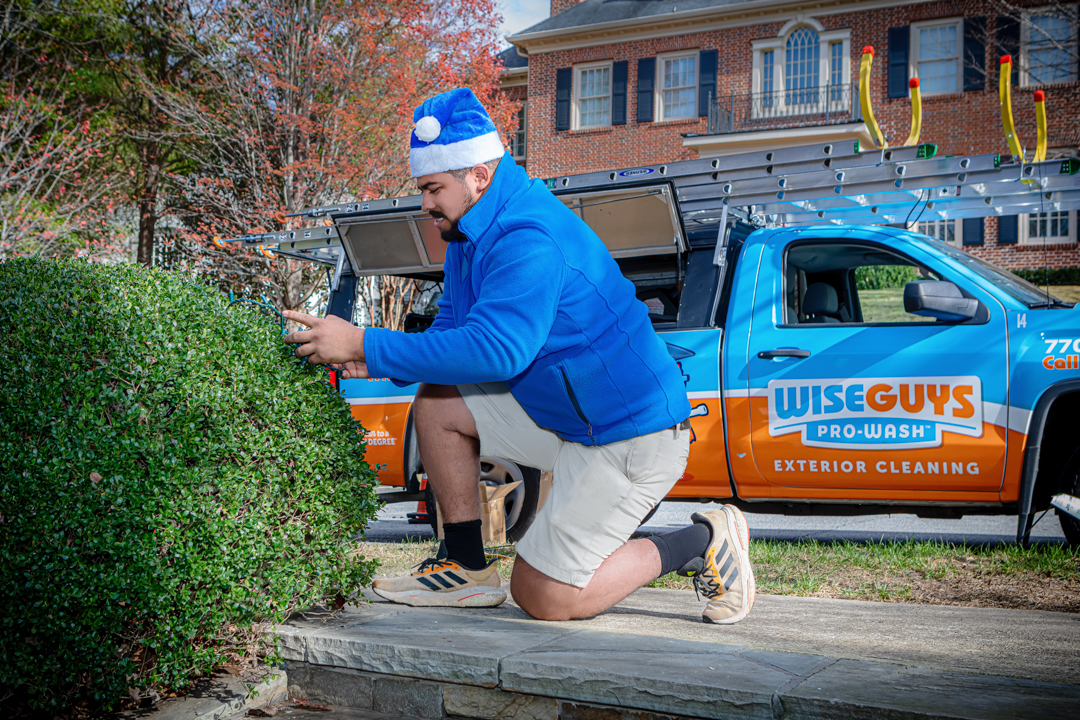 corporate marketing_advertising_commercial_ads_karen images 2023 - 039 - atlanta's commercial photographer wise guys lights installing christmas lights in dunwoody, ga by atlanta commercial photographer karen images