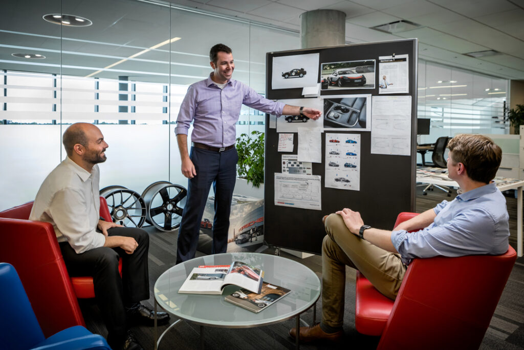 A corporate culture image of department heads in conference by Atlanta Commercial Photographer Karen Images