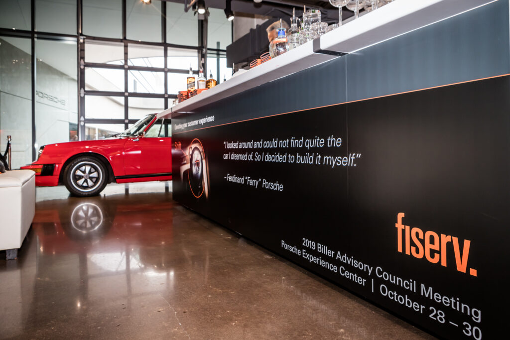 An image of Fiserv branding at a corporate event at One Porsche Drive photographed by Atlanta Commercial and Architectural Photographer Karen Images