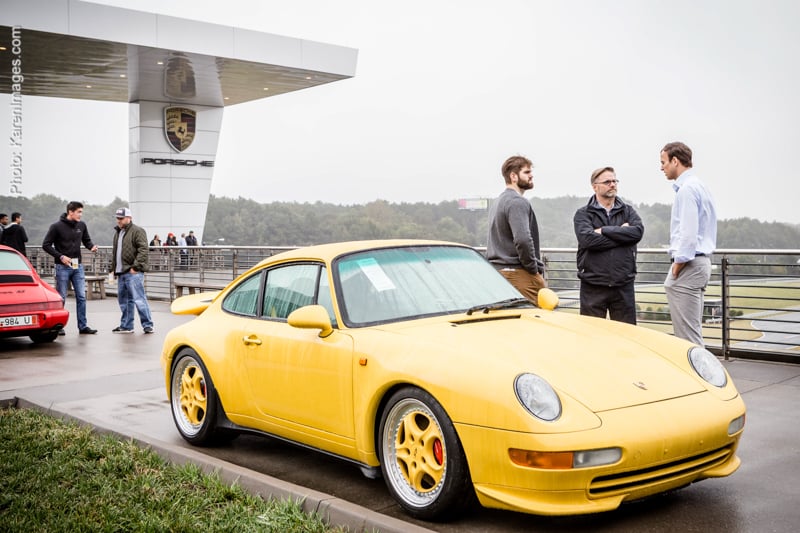 An image of guests on the terrace at a corporate event at One Porsche Drive photographed by Atlanta Corporate Event Photographer Karen Images