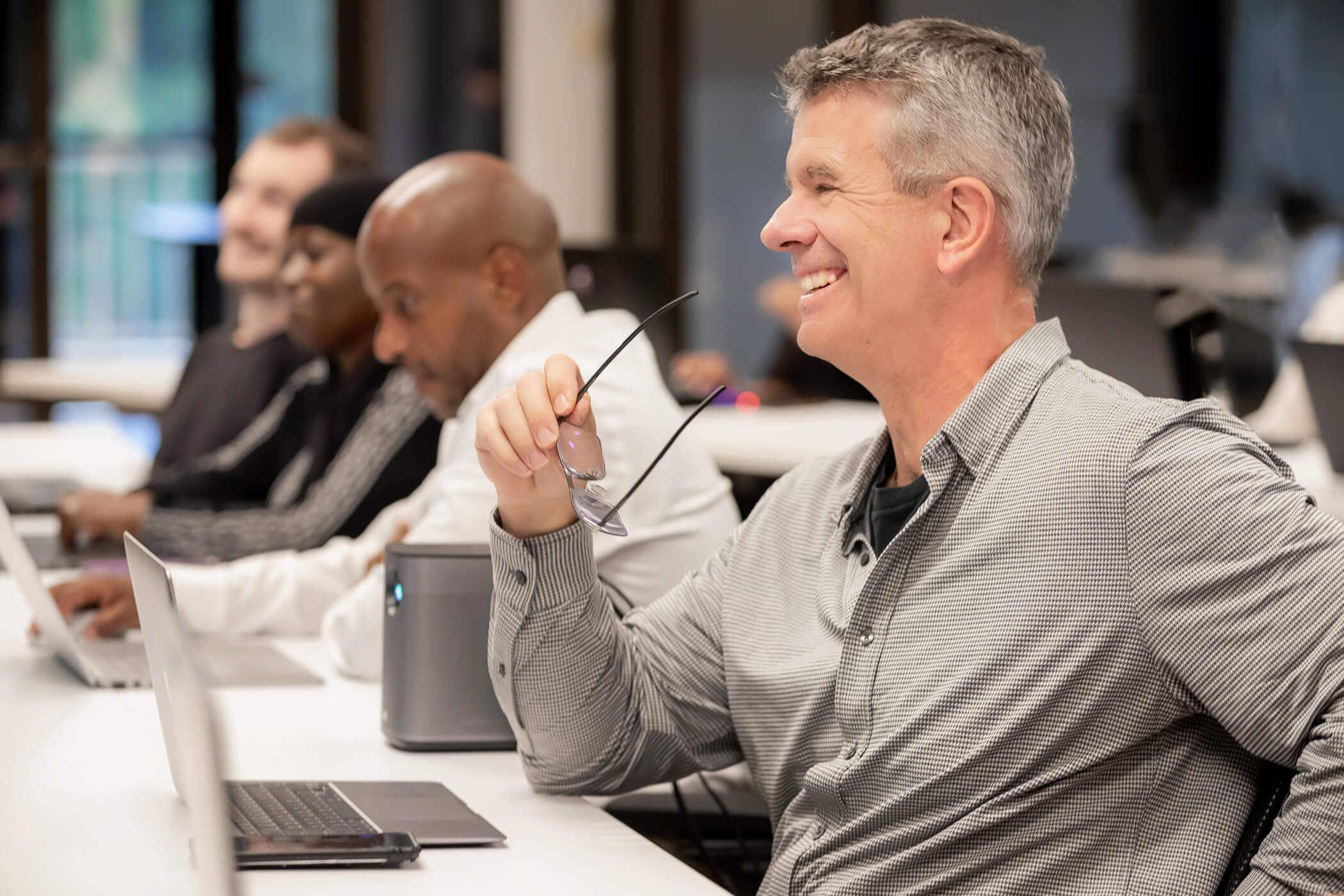 A team meeting at S2 Data captured during a brand building session capture by commercial photographer Karen Images