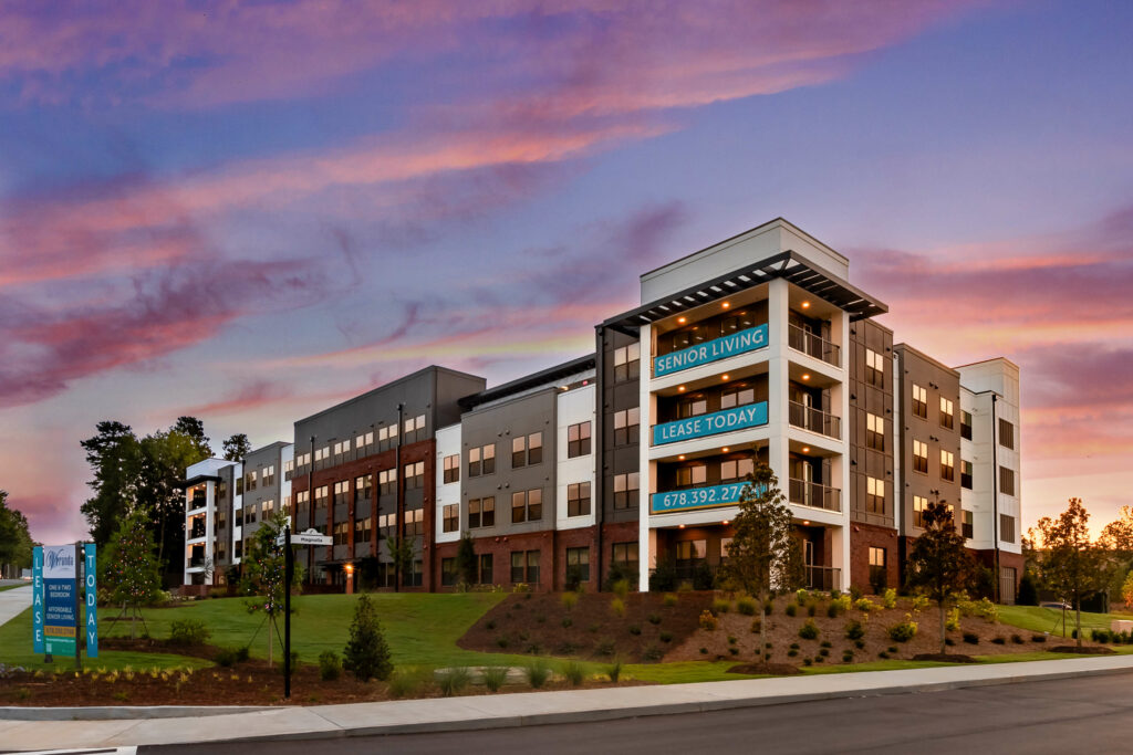 exterior of the veranda at assembley photographed at sunrise a kitchen in a one bedroom model home at crofthouse photographed by architectural photographer karen images