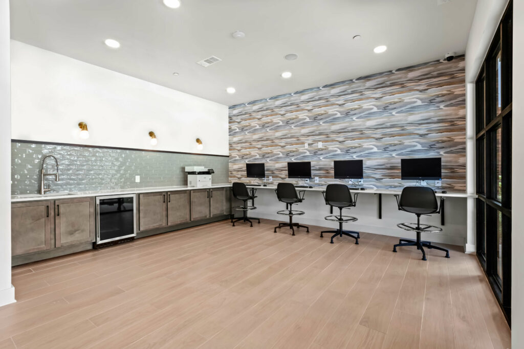 a co-work space at the veranda at assembly a kitchen in a one bedroom model home at crofthouse photographed by architectural photographer karen images
