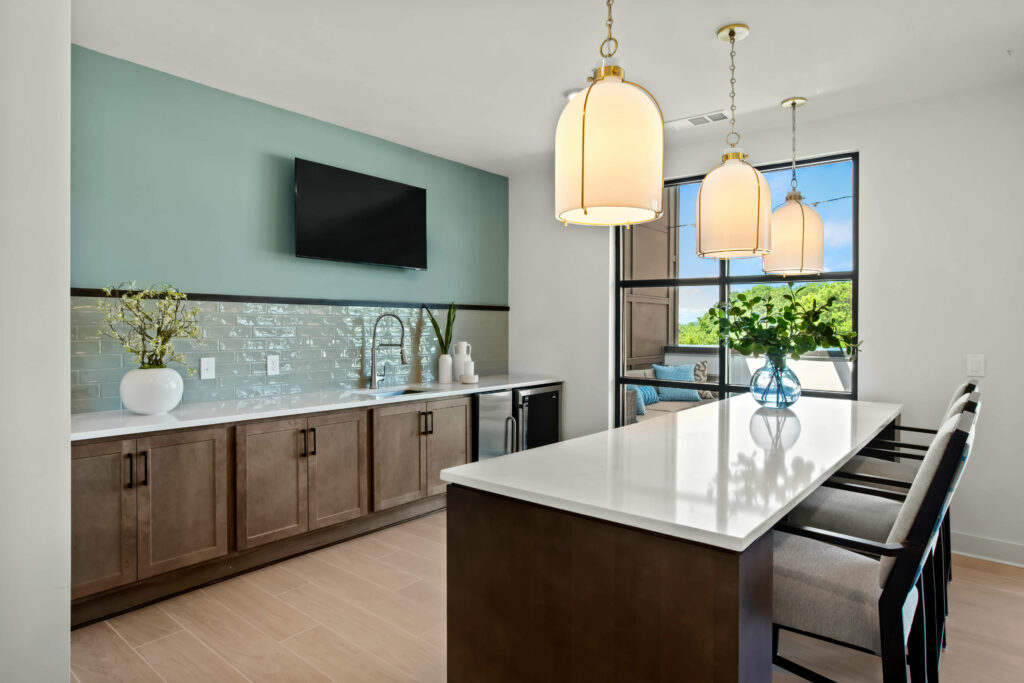 a kitchen in a 1-bedroom apartment at the veranda at assembly photographed by architectural photographer karen images