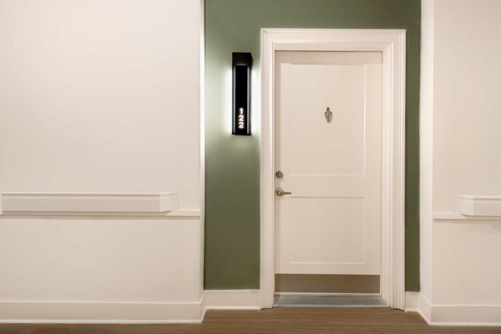 a door to a residence at the veranda at assembly photographed by architectural photographer karen images