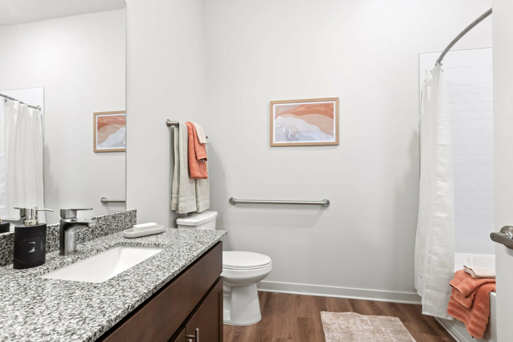 a bathroom in a model home at veranda at assembly