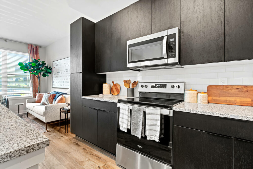 stove and cabinets in a 1 bedroom apartment at oslo by architectural photographer karen images