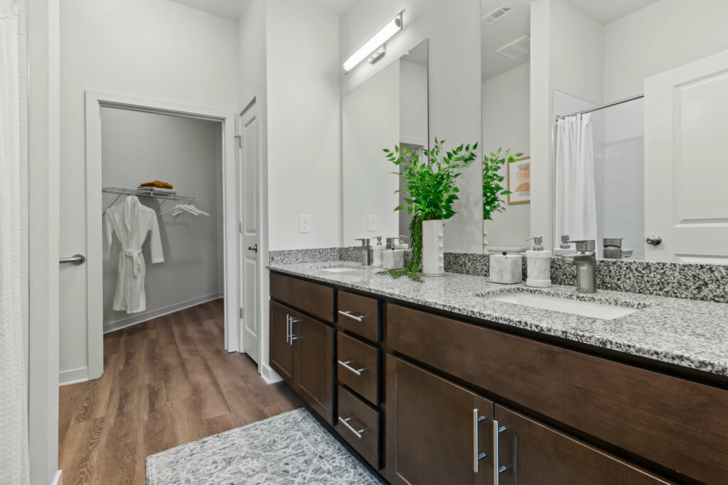 bathroom cabinets and closet in a bathroom at veranda at assembly photographed by architectural photographer karen images
