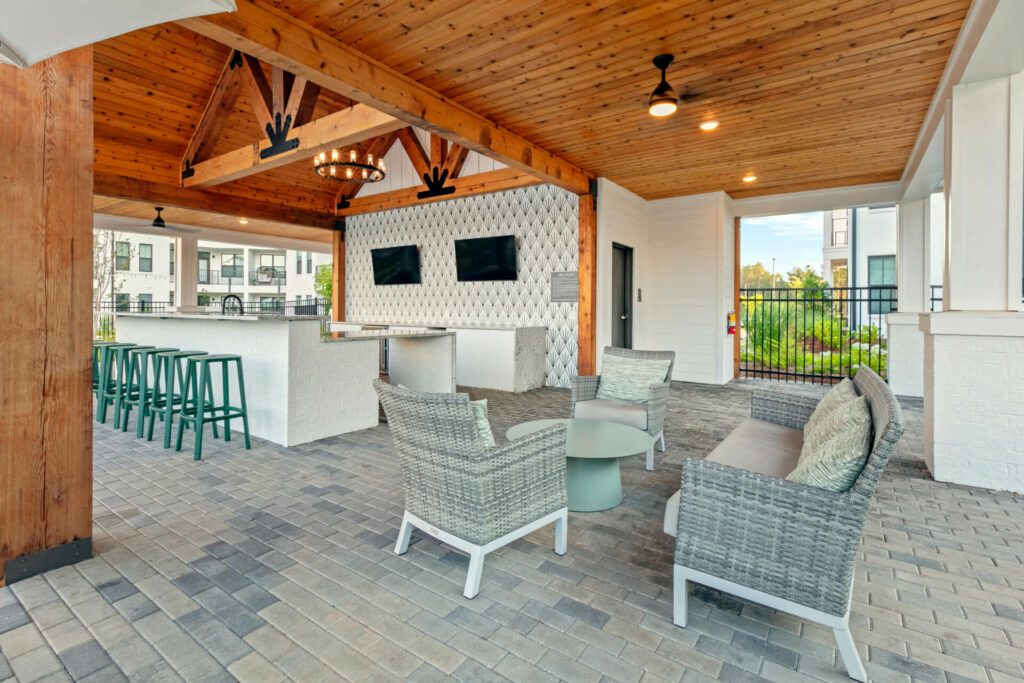 a poolside lounge at crofthouse photographed on a sunny day by architectural photographer karen images