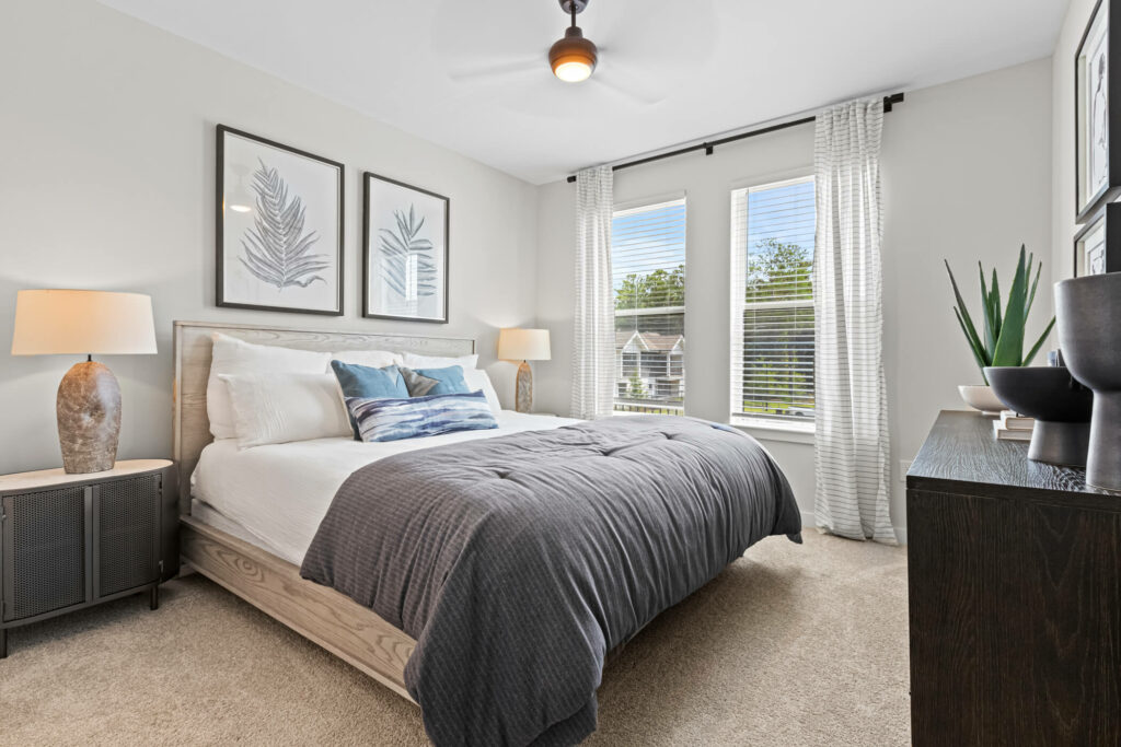 a bedroom in two bedroom model home at oslo by architectural photographer karen images