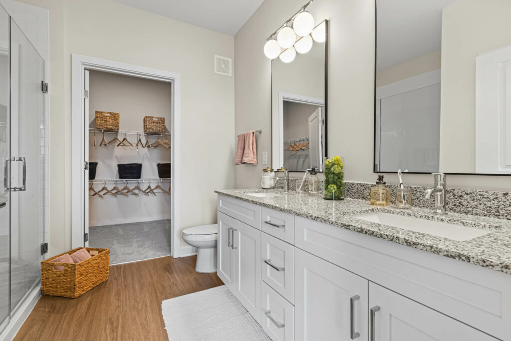 bathroom cabinets and closet in a two bedroom model home in oslo by architectural photographer karen images