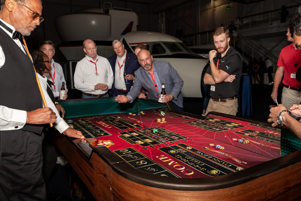 Guests participating in a casino activity during a corporate event