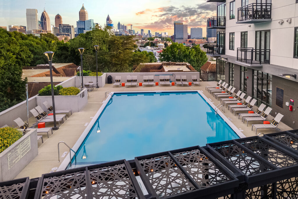 Arya swimming pool overlooking a skyline view of midtown Atlanta at twilight sunset