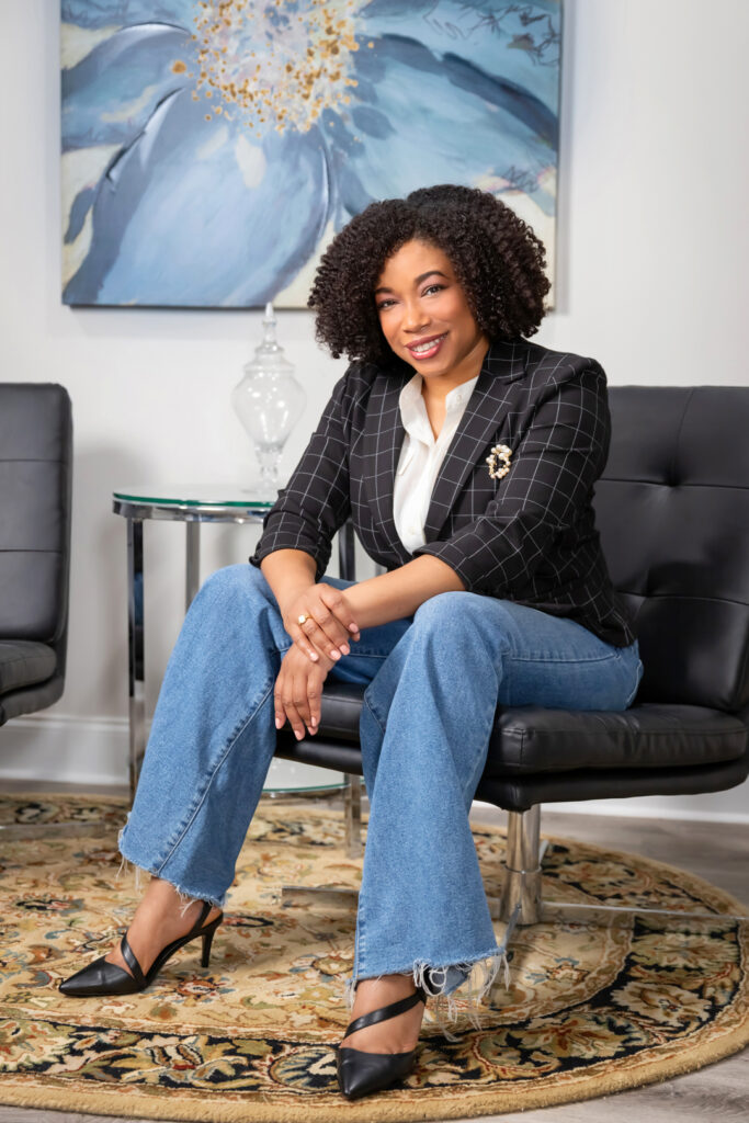 Lifestyl headshot of a business executive in a reception area