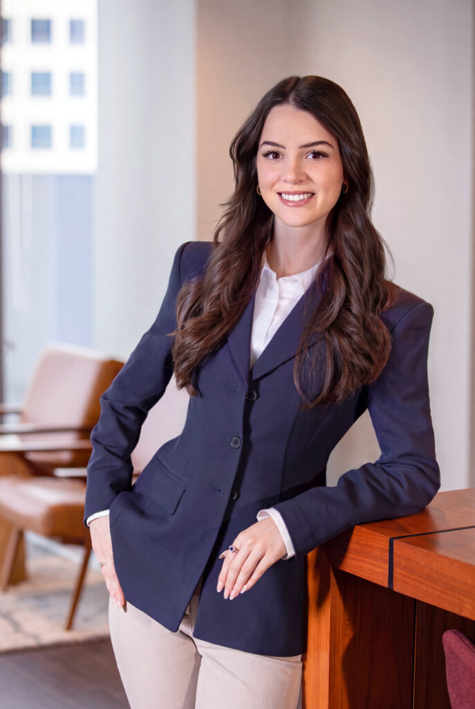 Lifestyle corporate headshot of a woman in an office environment